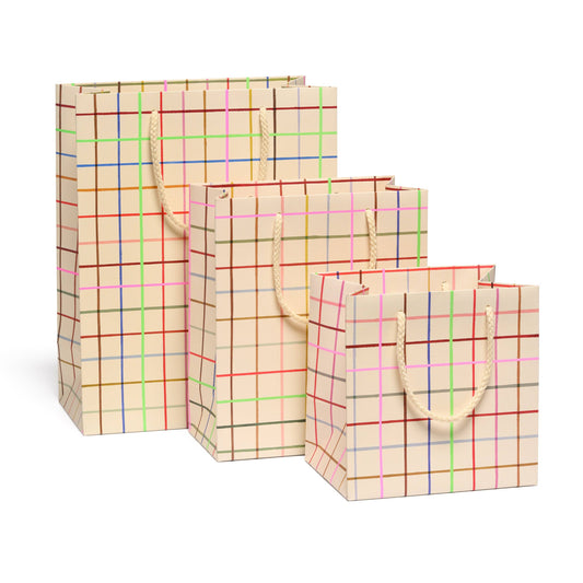 Sac cadeau moyen à motifs colorés